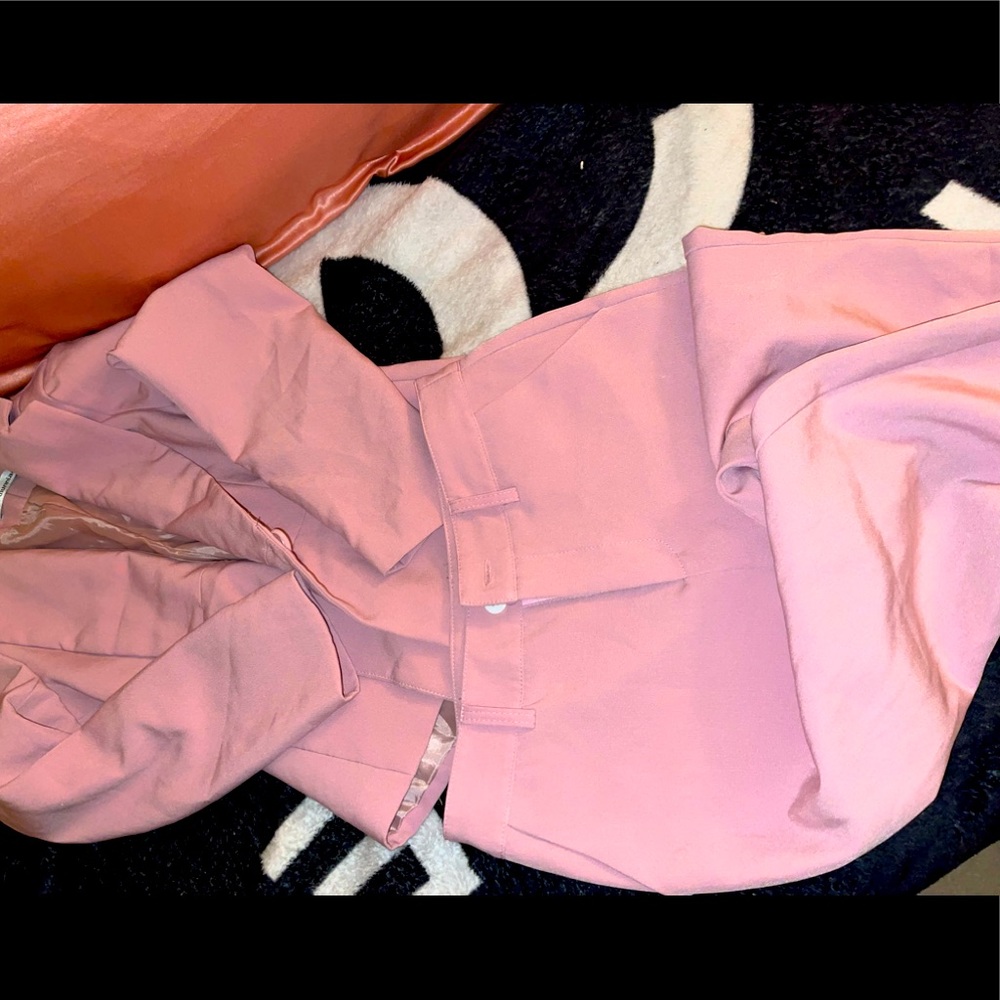 Pink blazer and trousers two piece suit